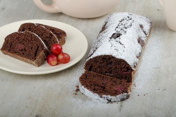 Chocolate cake with strawberries and grapes