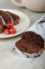 Chocolate cake with strawberries and grapes