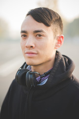 young crazy funny asian man in town