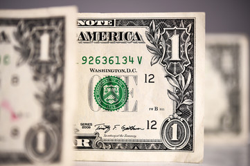 Close up of one dollar for background.