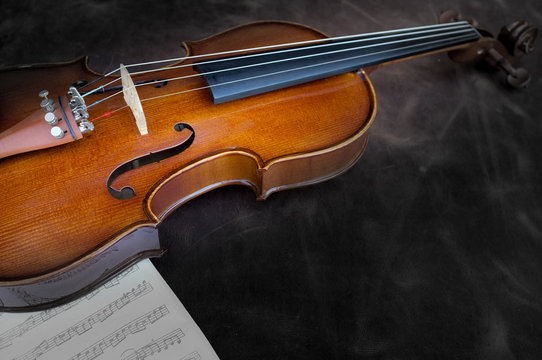 Classic violin vintage on leather background