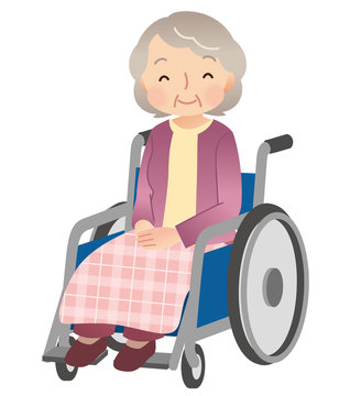 車椅子に乗る高齢者　女性