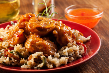 Fried chicken with rice and sweet and sour sauce