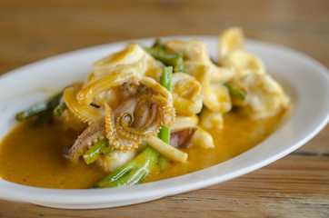 Stir fried squid with salted egg yolk
