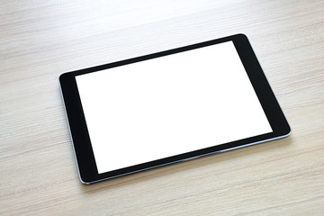 Tablet pc on wooden table