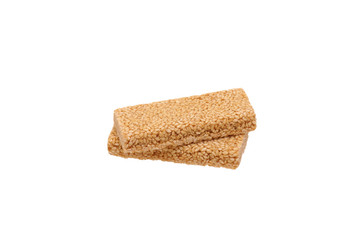 Peanut brittle with sesame seeds.