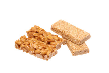 Peanut brittle with sesame seeds and peanuts.