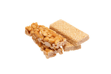 Peanut brittle with sesame seeds and peanuts.