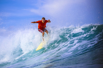 Surfer on Amazing Blue Wave