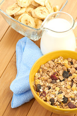 Delicious and healthy cereal in bowl with milk