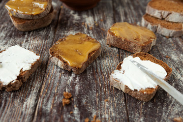 pieces of bread with butter and honey