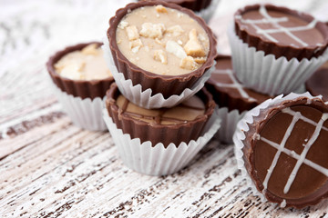 Dark chocolate on wooden background