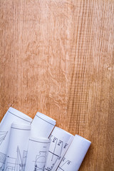 copyspace image white blueprints on old brown wooden board