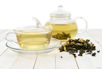 Glass cup and kettle isolated