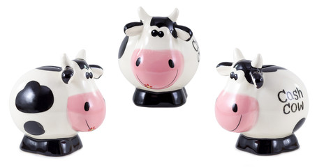 Piggy bank with black and white cow spots