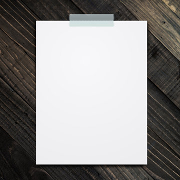 empty white paper sheet on wood background