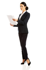 Businesswoman with paper notes