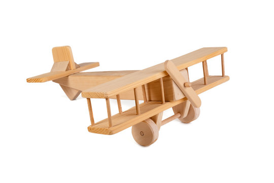 wooden airplane toy isolated on white background