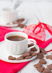 Hot cocoa and cookies hearts. Selective focus