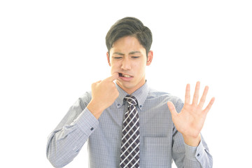 歯痛を訴える男性