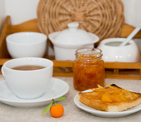Tangerine jam with slice of bread