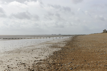 low tide on shingle beach at New Romney