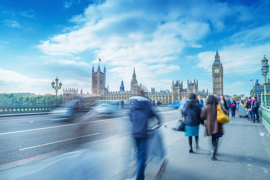 Blurred People Moving On Westminster Bridge, London