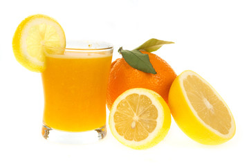 Juice in glass with citrus fresh fruit