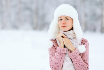 Portrait of a pretty woman in winter day