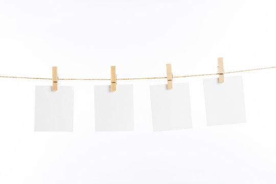 paper cards hanging rope isolated