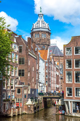 Fototapeta premium Canal and St. Nicolas Church in Amsterdam