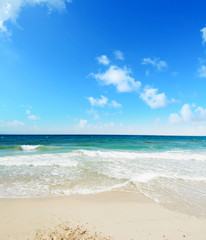 Poetto beach under a blue sky