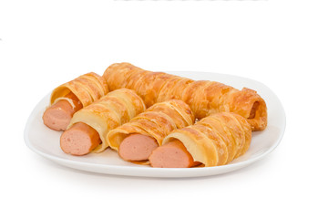 croissant hotdog roll on dish,isolated