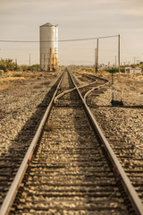 Fototapeta na wymiar Train Tracks Leading to the Horizon