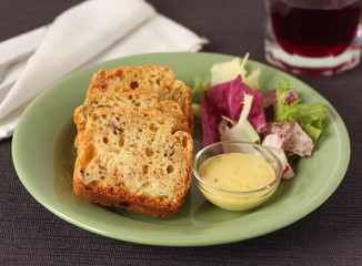 Savory cheese loaf with salad and sauce