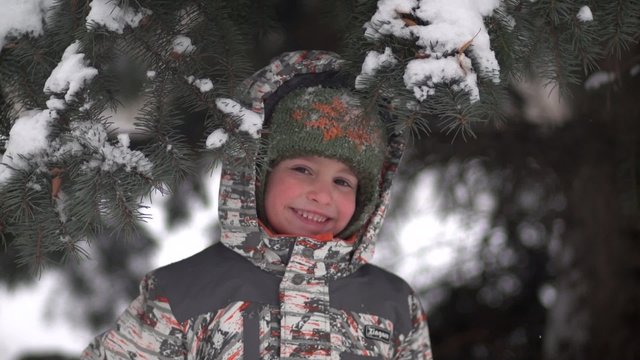 Cute kid under the Christmas tree