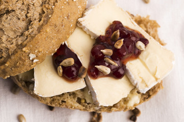 bread served with camembert and cranberry