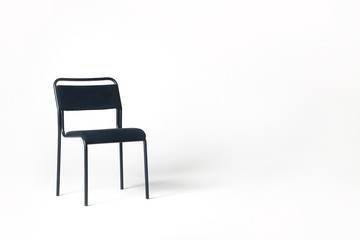 chair with blank space and white wall