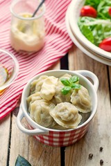Dumplings with meat and dough pelmeni
