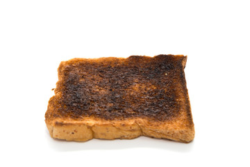 Burnt toast slice isolated on white background