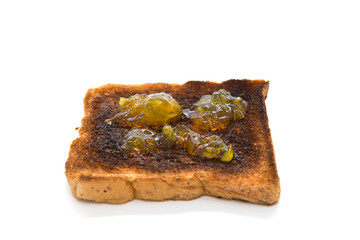 Burnt toast slice isolated on white background