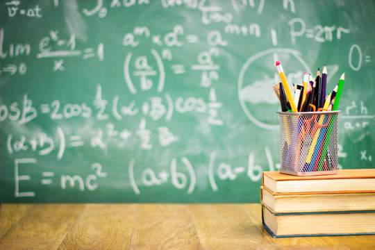 Books and blackboard