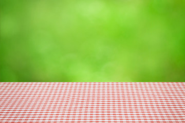 checkerboard table with green natural background