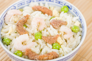 Fototapeta na wymiar Special Fried Rice - Chinese rice with pork, prawns and egg