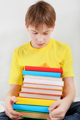 Sad Teenager with a Books