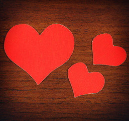 Obraz premium Heart Shapes on the Wooden Background