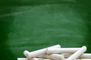 circle of chalk formed on a green chalkboard