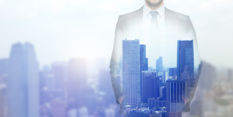 close up of businessman over city background