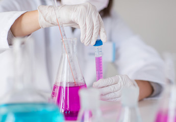 close up of scientist making test in lab