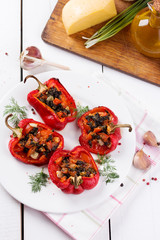 Roasted bell peppers stuffed with pesto and tomato